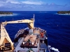passengers-watch-dolphins-as-the-aranui-enters-fakarava-lagoon-tuamotu-group